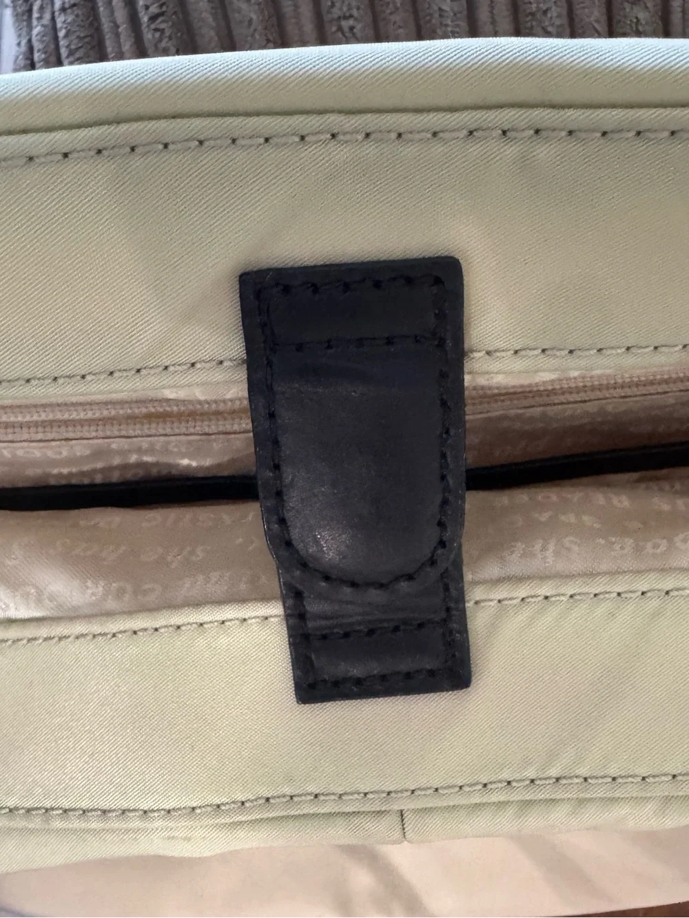 kate spade beige tote with black bow and straps